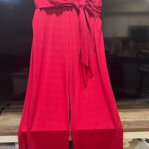 New Krisa red, high-waisted, wide-leg pants featuring an elastic waist.